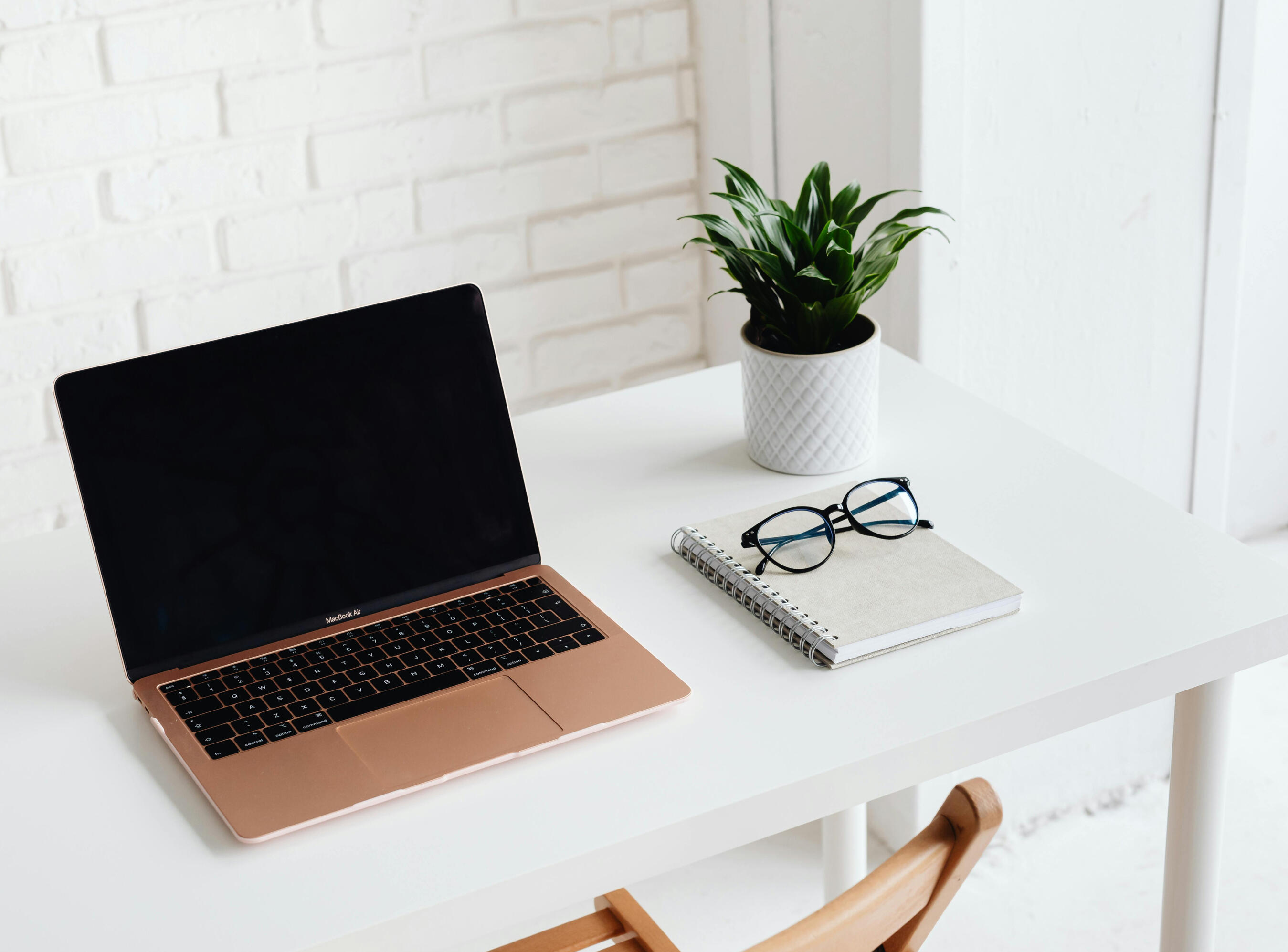Office desk and laptop desk laptop notebook and glasses